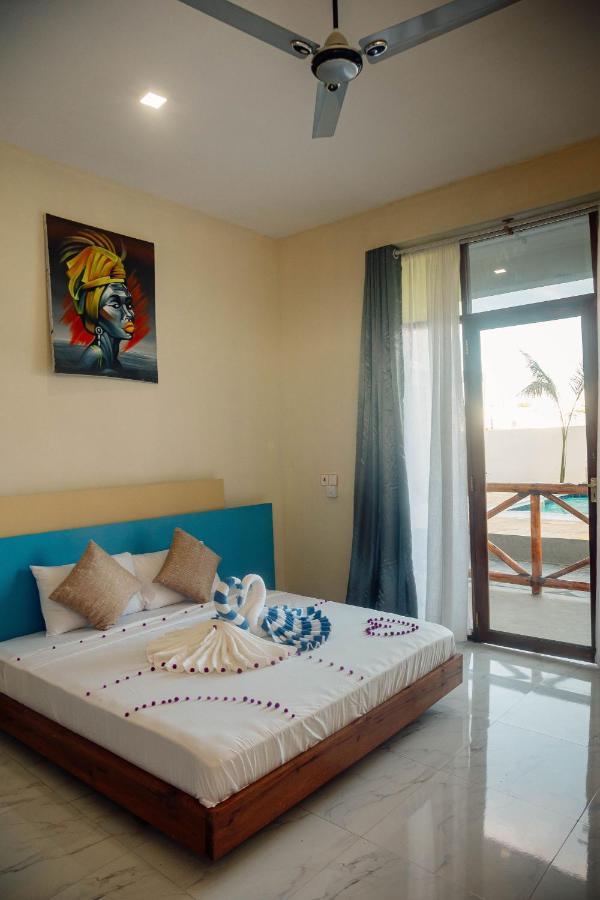 Ocean Breeze Hotel Нунгви Экстерьер фото