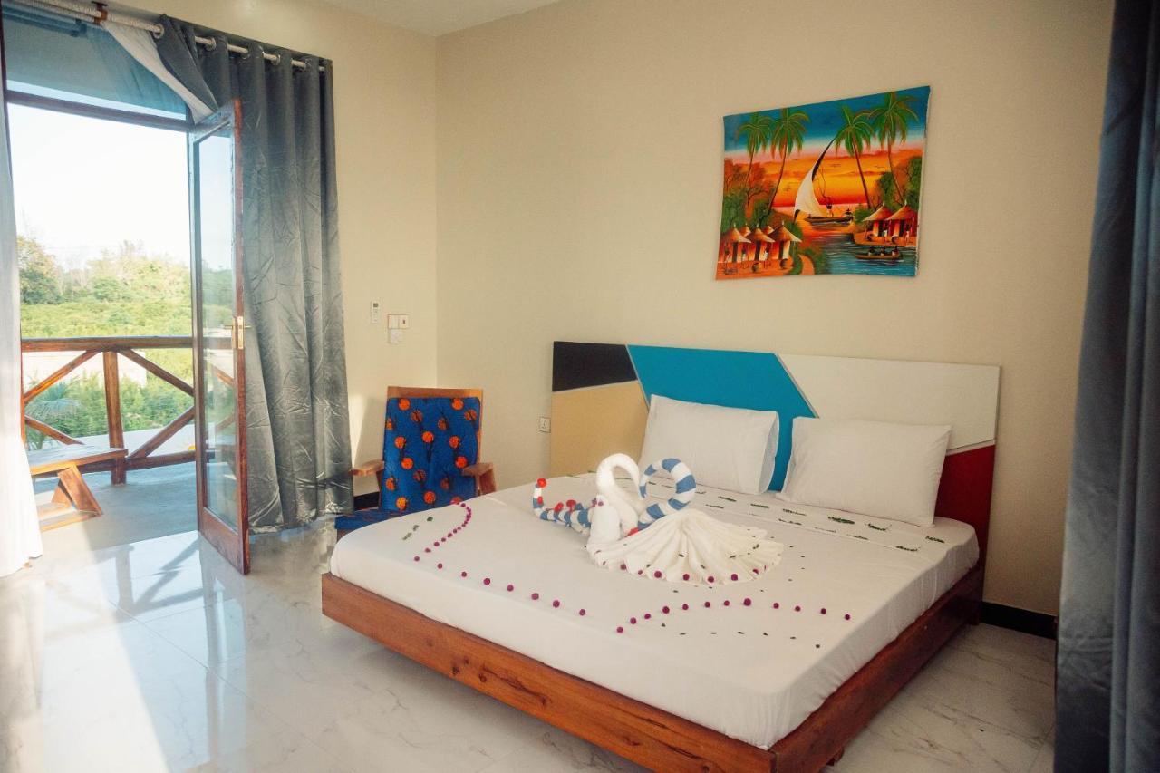 Ocean Breeze Hotel Нунгви Экстерьер фото